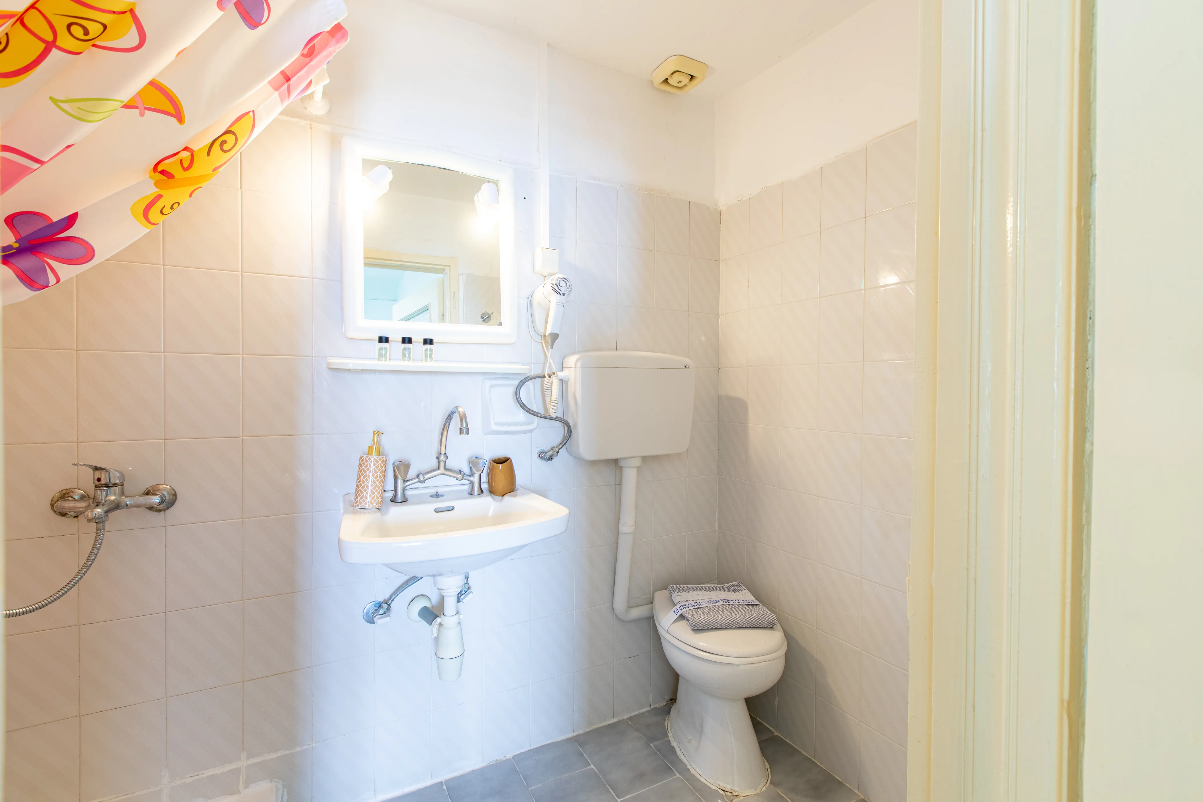 side view of the hotel room bathroom